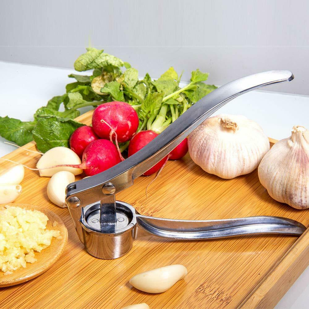 Stainless Steel Professional Grade Heavy Duty Garlic Press for crushing or mincing - Premium Kitchen Tools from CJ's Dropshipping - Just $14.99! Shop now at Home Accents and Decor